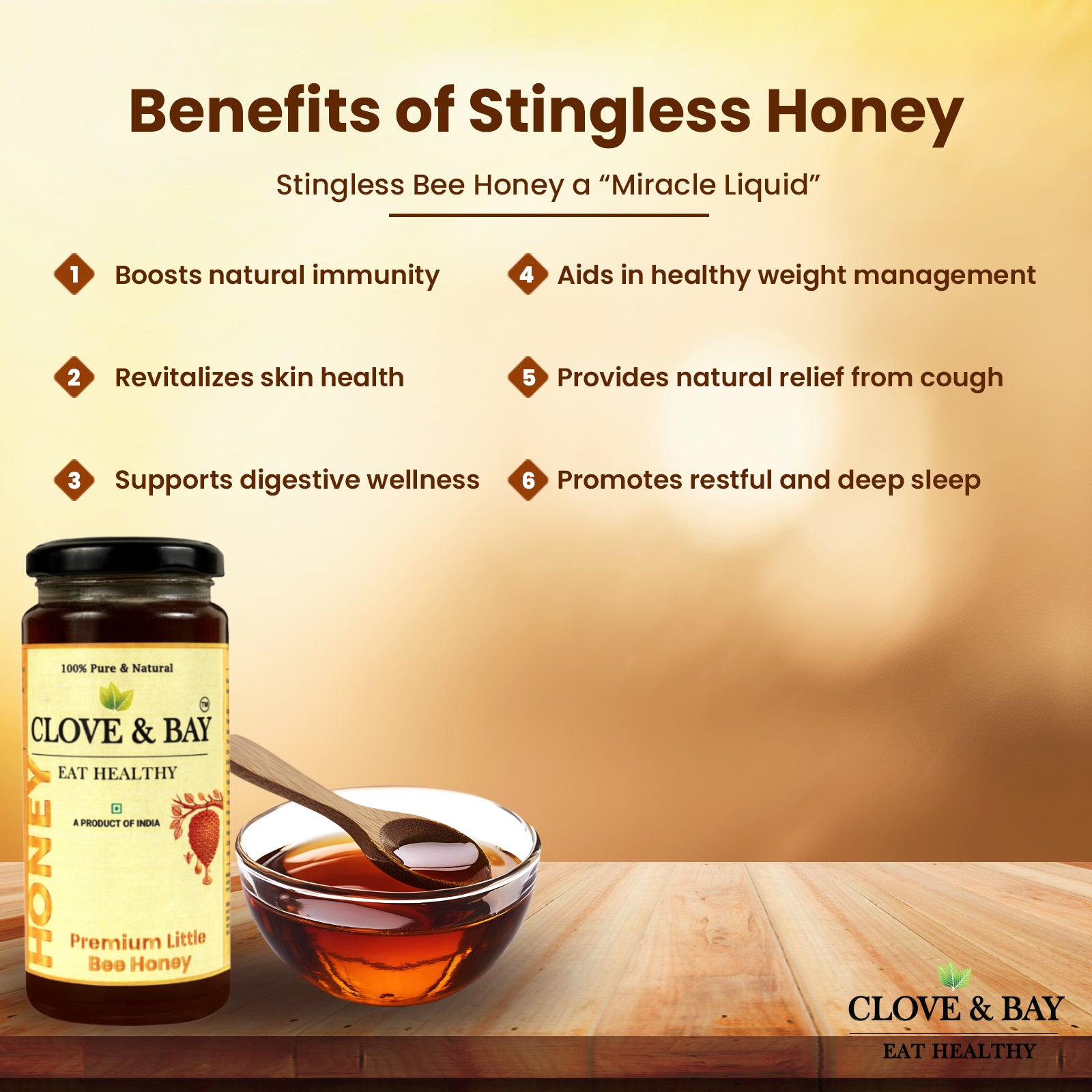 Clove & Bay honey jar and bowl with honey on a wooden surface, featuring benefits of stingless honey.